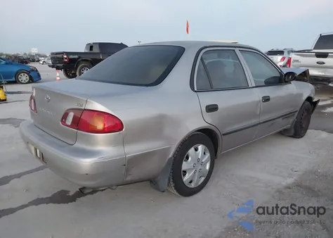 2000 Toyota Corolla Ce из США, поврежденный, VIN 1NXBR12E5YZ307385